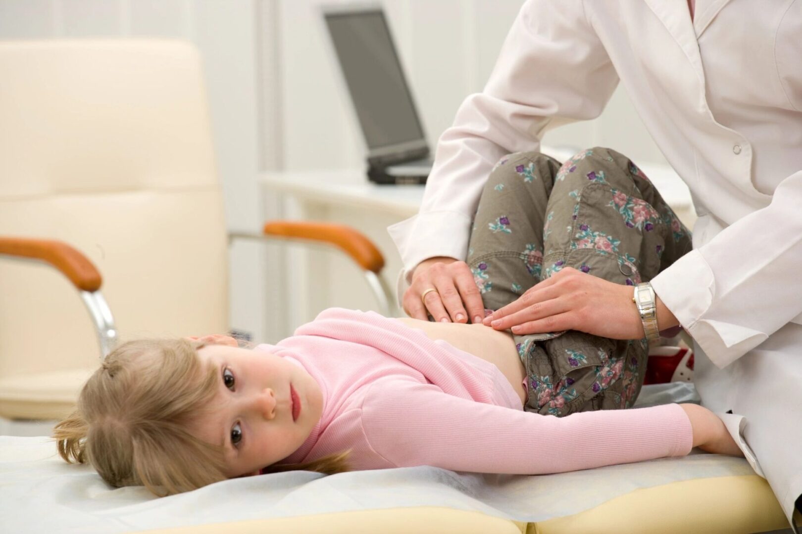 doctor checking child